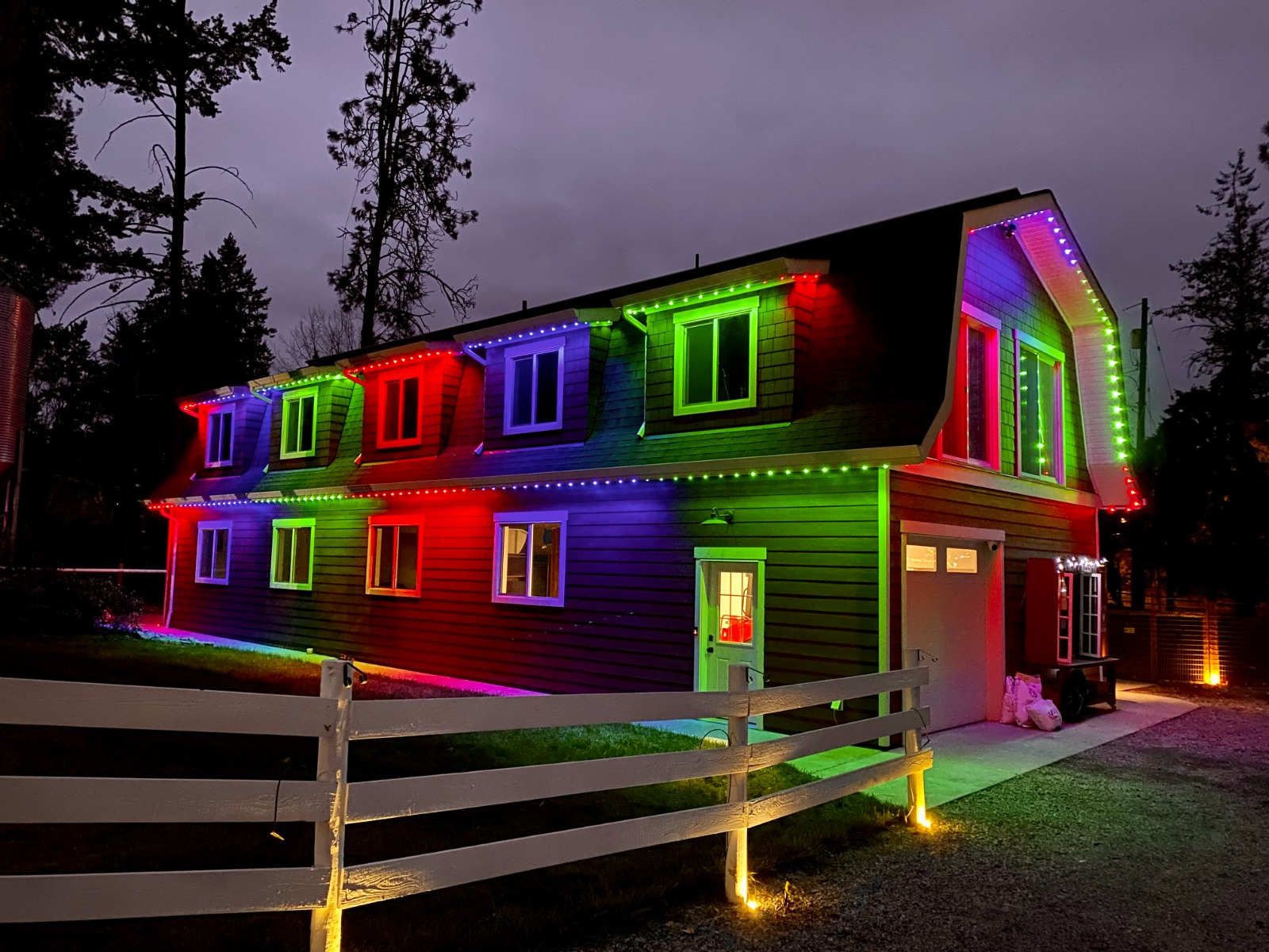 House with green, red, and blue LED lighting display