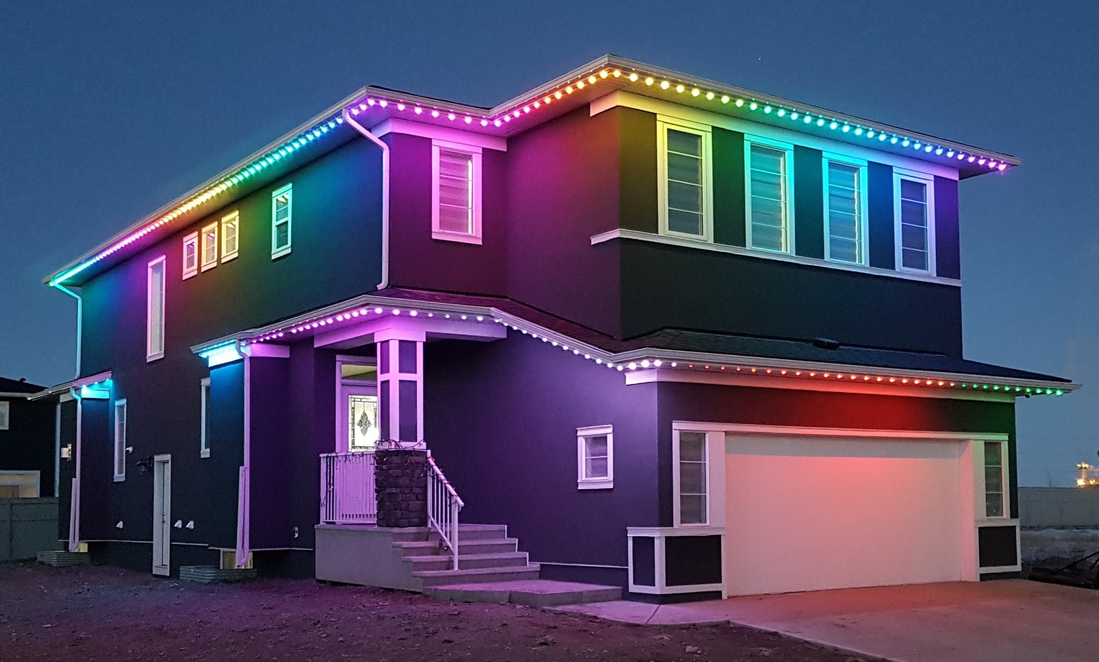 House with rainbow LED lighting display