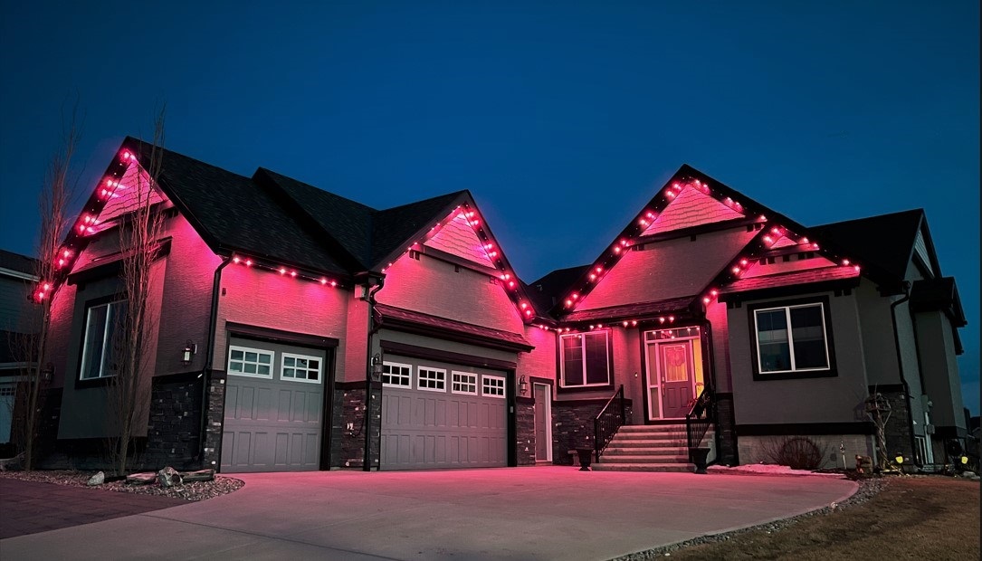 House illuminated with red LED lighting
